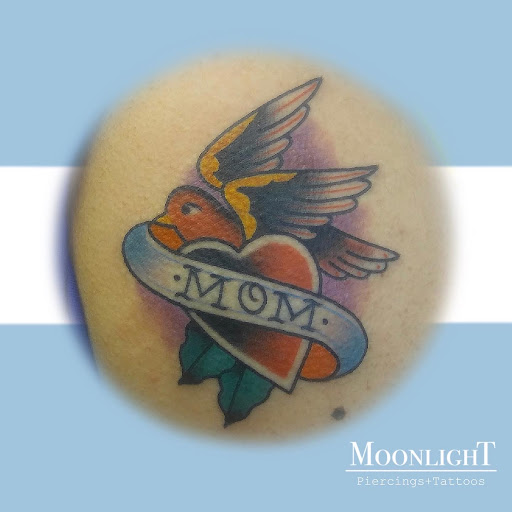 Explore mental health ribbon tattoo ideas, creative tattoo ideas in Houston, available at Moonlight Piercings & Tattoos Studio