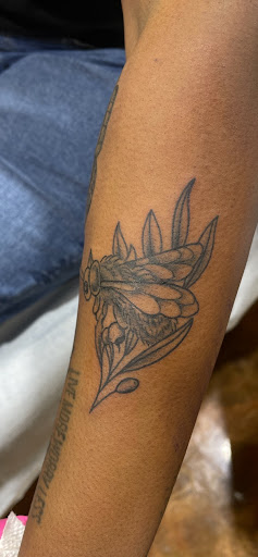 Explore little tattoo ideas for men, creative tattoo ideas in Marietta, available at The Queen Bee Tattoo and Piercing Parlour