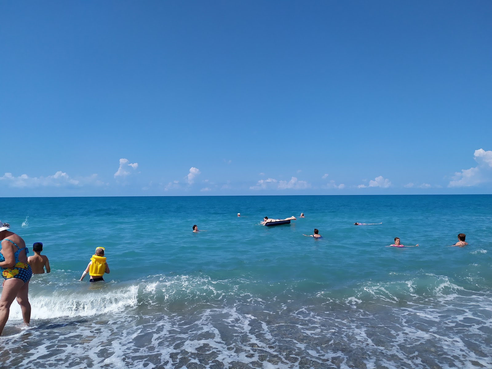 Foto van Flamingo beach met turquoise puur water oppervlakte