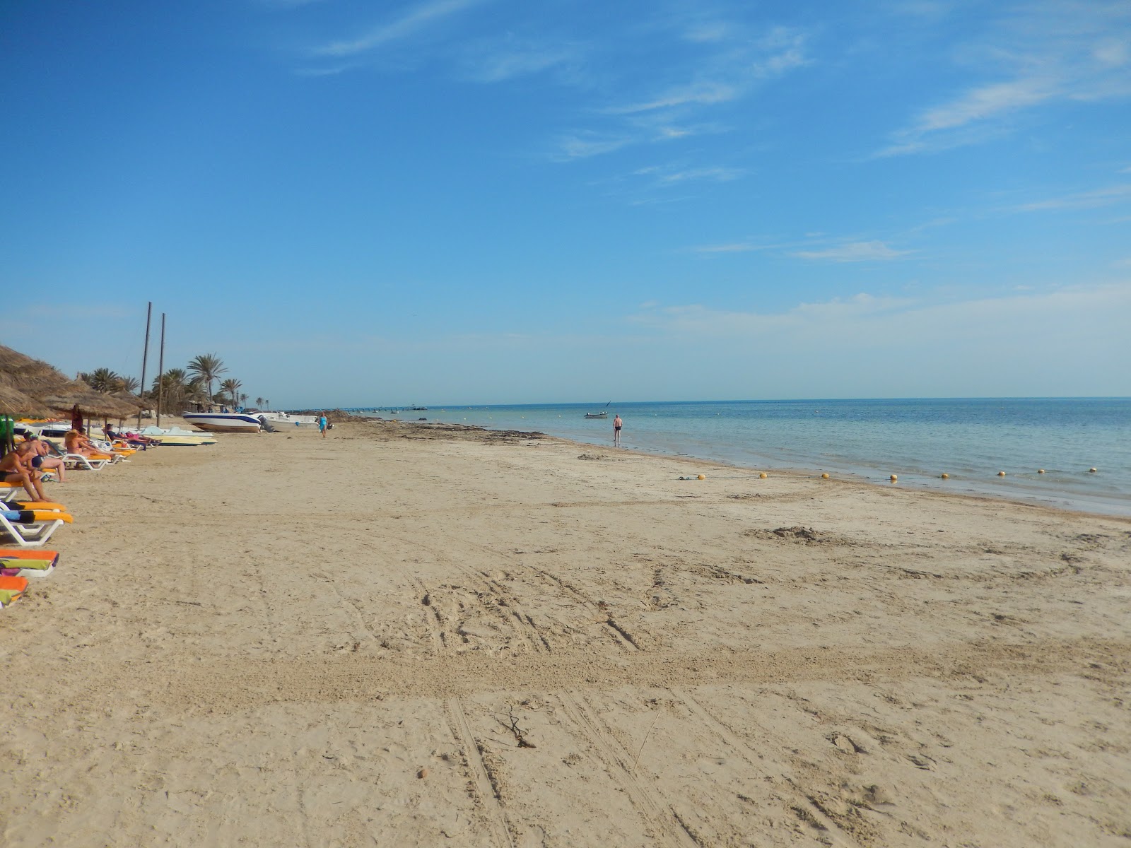 Fotografija Sangho beach in naselje