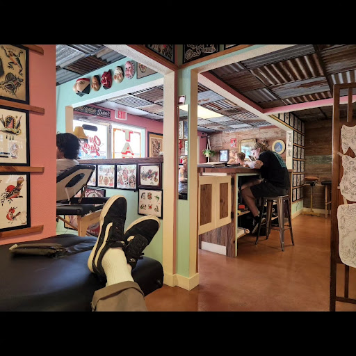 Explore ripped skin tattoo ideas, creative tattoo ideas in San Marcos, available at Our Lady Tattoo Parlor