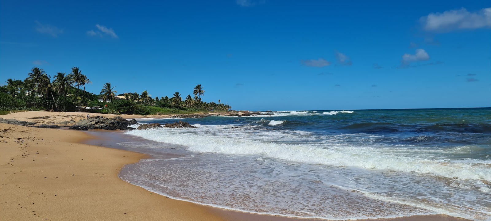 Praia Farol de Itapua的照片 带有长直海岸