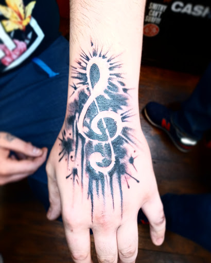Explore deceased dog tattoo ideas, creative tattoo ideas in Altoona, available at Railroad City Tattoo