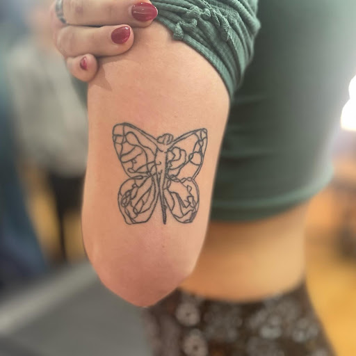 Explore february birth flower tattoo ideas, creative tattoo ideas in Belgrade, available at The Loyal Sparrow Tattoo and Piercing