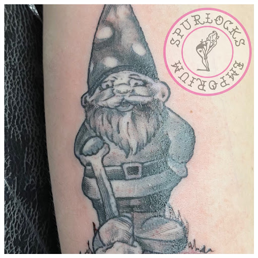 Explore cover up ideas for ankle tattoos, creative tattoo ideas in Muskogee, available at Spurlocks Emporium