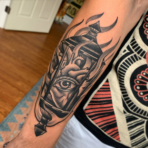 Explore cover up tattoo ideas female back, creative tattoo ideas in Grandville, available at Lighthouse Tattoo Company