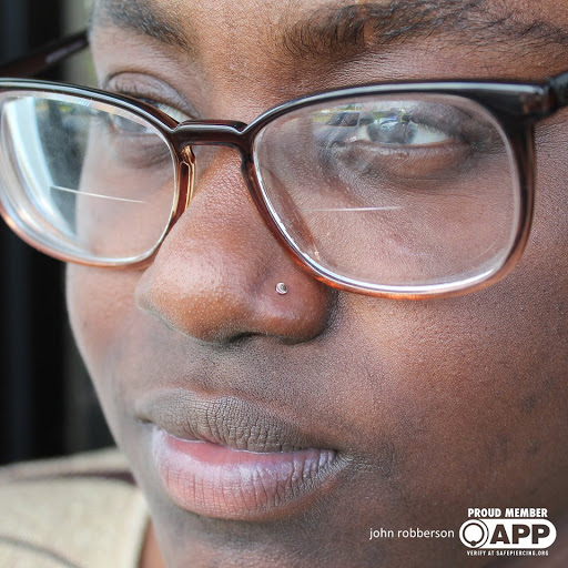 Explore crystal ball tattoo ideas, creative tattoo ideas in Fort Myers, available at Tiger Lotus Tattoo and Piercing