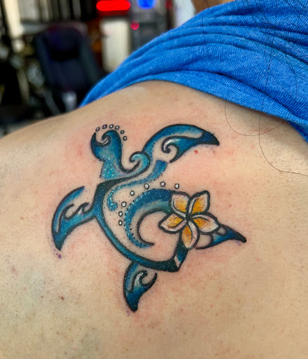 Explore hood tattoo ideas, creative tattoo ideas in Honolulu, available at Sacred Art Tattoo Waikiki