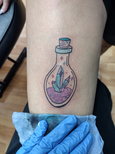 Explore simple stick and poke tattoo ideas, creative tattoo ideas in Benton, available at Spectrum Tattoo