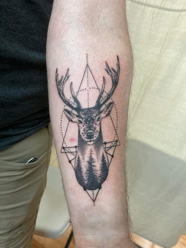 Explore pin up girl tattoo ideas, creative tattoo ideas in Benton, available at Spectrum Tattoo