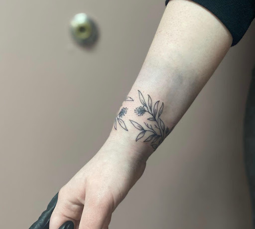 Find feminine skull tattoo ideas for your next unique tattoo in Kenosha at Kenosha Tattoo Company