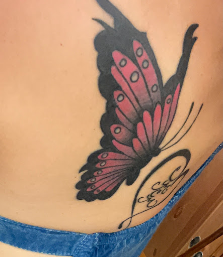 Explore flower tattoo cover up ideas, creative tattoo ideas in Northampton, available at NiteOwl Tattoo