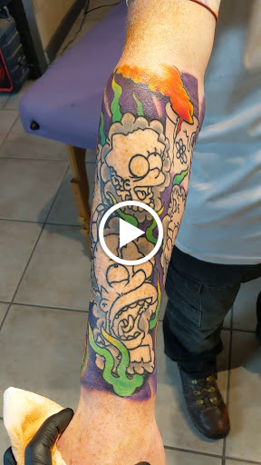 Explore motocross tattoo ideas, creative tattoo ideas in Omak, available at Eight of Hearts Tattoo Parlor