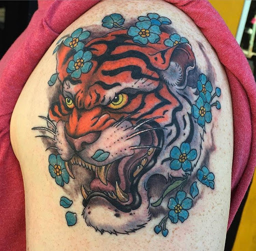 Explore wrap around arm tattoo ideas, creative tattoo ideas in Phoenixville, available at Grace Tattoo