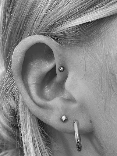 Explore only the strong survive tattoo ideas, creative tattoo ideas in Palm Harbor, available at Angry Owl Tattoo and Piercing
