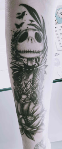 Explore marigold tattoo ideas, creative tattoo ideas in Anniston, available at Ink Therapy LLC Tattoo Studio