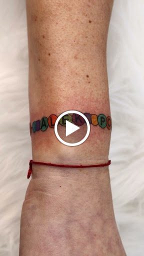 Explore thigh flower tattoo ideas, creative tattoo ideas in Westwood, available at Dom Astro Tattoo Company