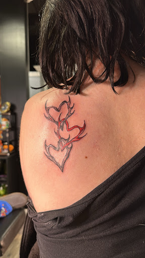 Explore tattoo ideas on rib cage, creative tattoo ideas in Fallston, available at Flesh Tattoo Company