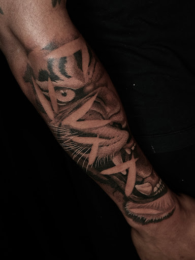 Explore world traveler tattoo ideas, creative tattoo ideas in Norcross, available at Brotherhood Tattoo