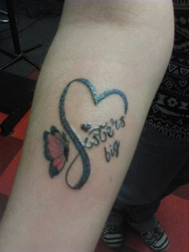 Tattoo Shop «AWOL Custom Tattooing Llc», reviews and photos, 1780 W Sherman Blvd, Muskegon, MI 49441, USA