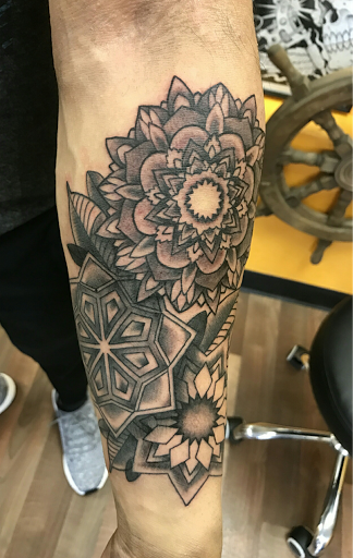 Explore ideas for spine tattoos, creative tattoo ideas in Stockton, available at THE PIRATES LOUNGE TATTOO PARLOR