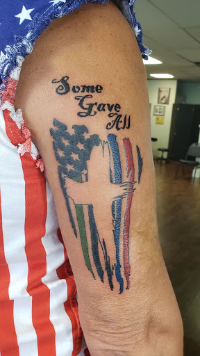 Explore stretch mark tattoo ideas, creative tattoo ideas in Littleton, available at Living Canvas Tattoo and Piercing