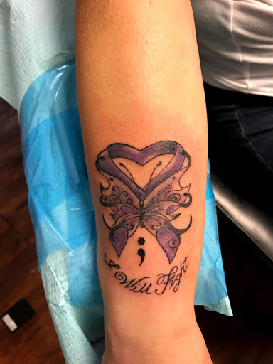 Explore mk tattoo ideas, creative tattoo ideas in Seymour, available at American Gypsy Tattoo Corp.