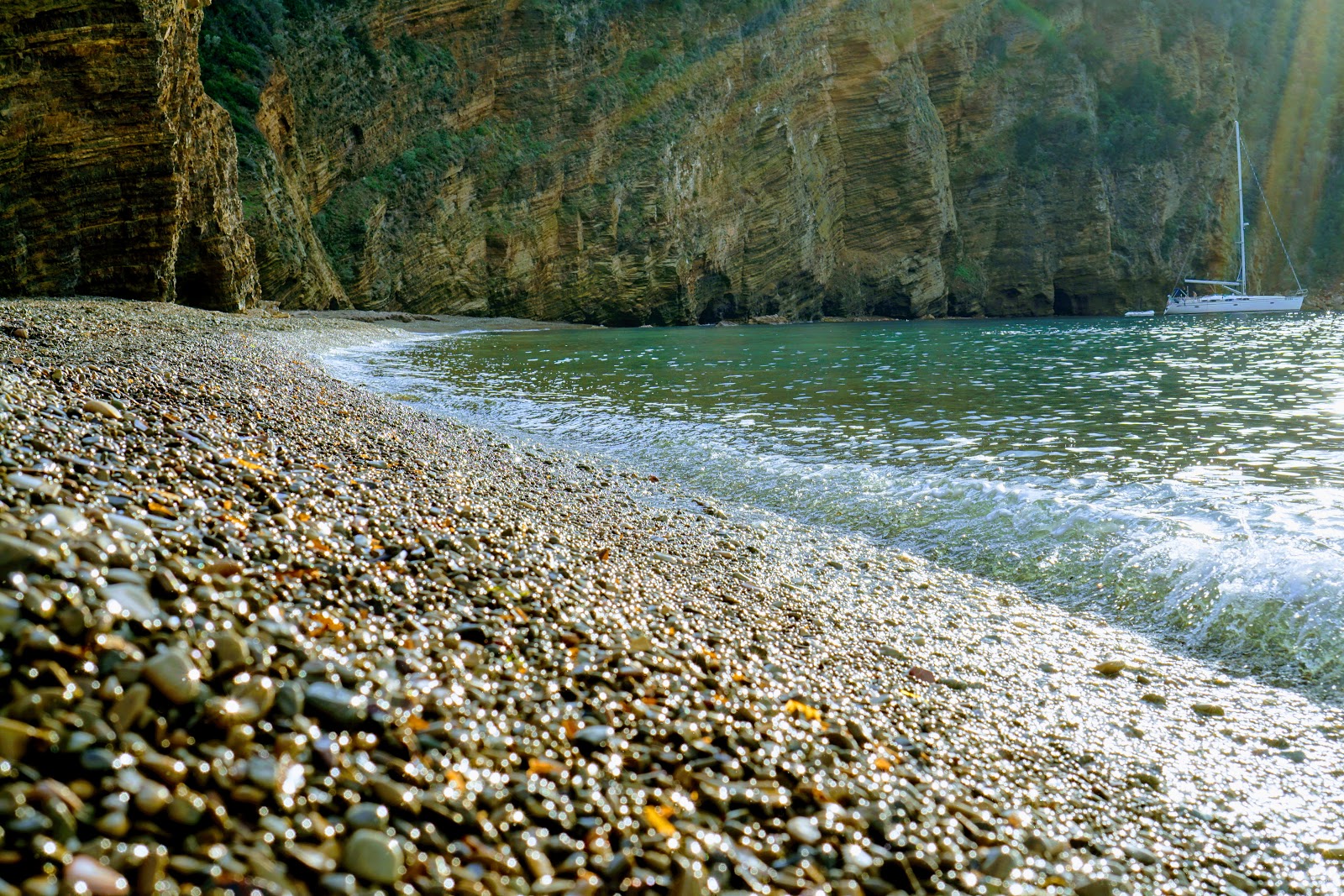 Photo de Zupignano beach avec un niveau de propreté de partiellement propre