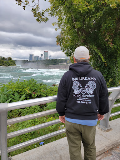 Explore aquarius tattoo ideas for men, creative tattoo ideas in Morristown, available at Ink Dreams Tattoo