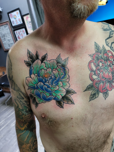 Explore scissor tattoo ideas, creative tattoo ideas in Yakima, available at Wallflower Body Piercing & Crazy Ink Tattoo