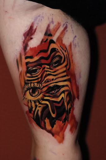 Explore tiki tattoo ideas, creative tattoo ideas in Nashville, available at RedBird Tattoo