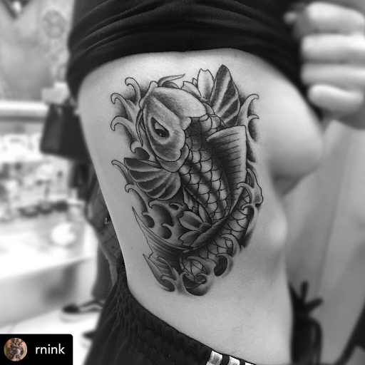 Find alpha and omega tattoo ideas for your next unique tattoo in Murrieta at Diamond City Tattoo & Piercing