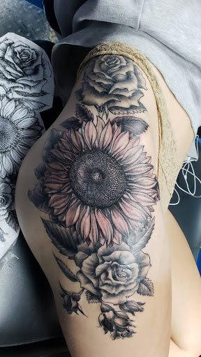 Explore women leg tattoo ideas, creative tattoo ideas in North Aurora, available at Ink Bar Tattoo