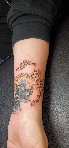 Explore cuff tattoo ideas, creative tattoo ideas in Spokane, available at All About It Tattoo Studio