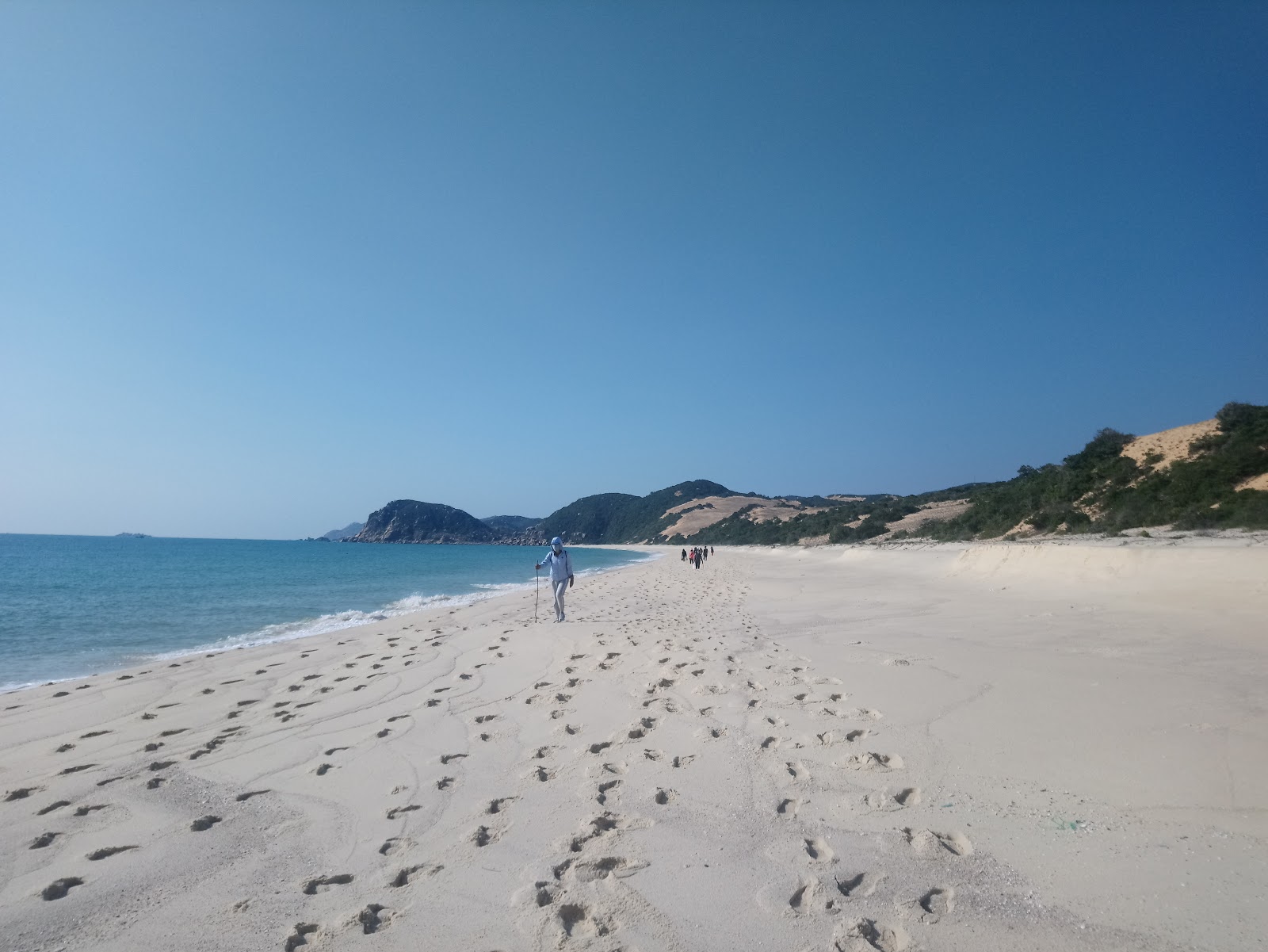 Fotografija Na Beach z svetel pesek površino