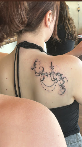 Find sunflower tattoo ideas for your next unique tattoo in Winter Haven at Angry Elephant Tattoos Winter Haven