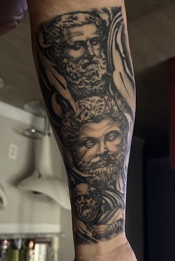 Explore chest and neck tattoo ideas, creative tattoo ideas in Sarasota, available at Oddity Tattoo Art University