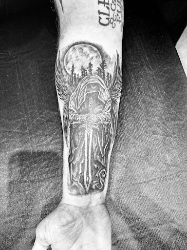 Explore ankle tattoo ideas male, creative tattoo ideas in Neptune, available at Neptune Tattooville