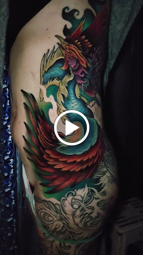 Explore kiss tattoo ideas, creative tattoo ideas in Buford, available at Inked Arts Tattoo Studio