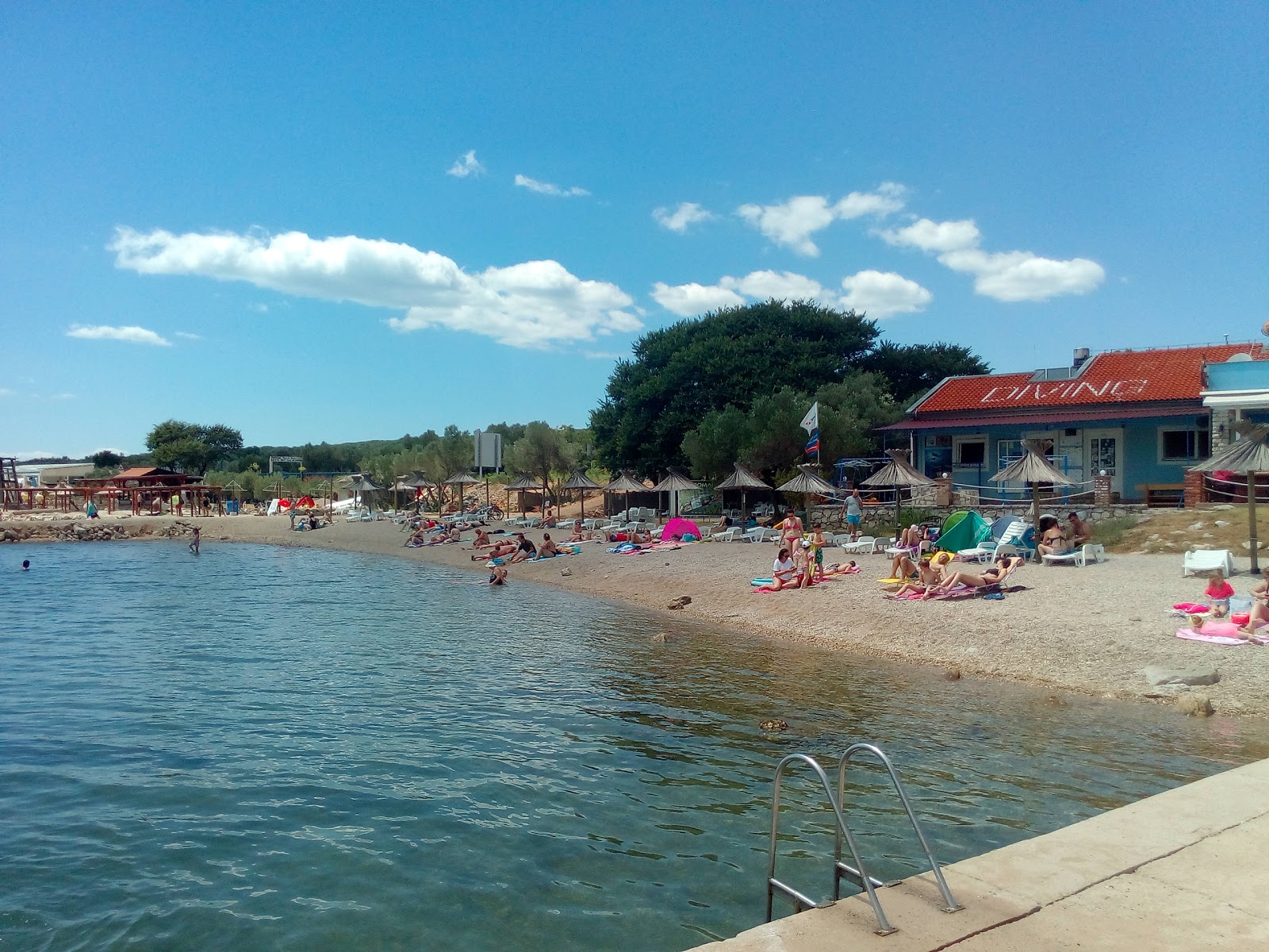 Fotografija Dunat beach z lahki fini kamenček površino