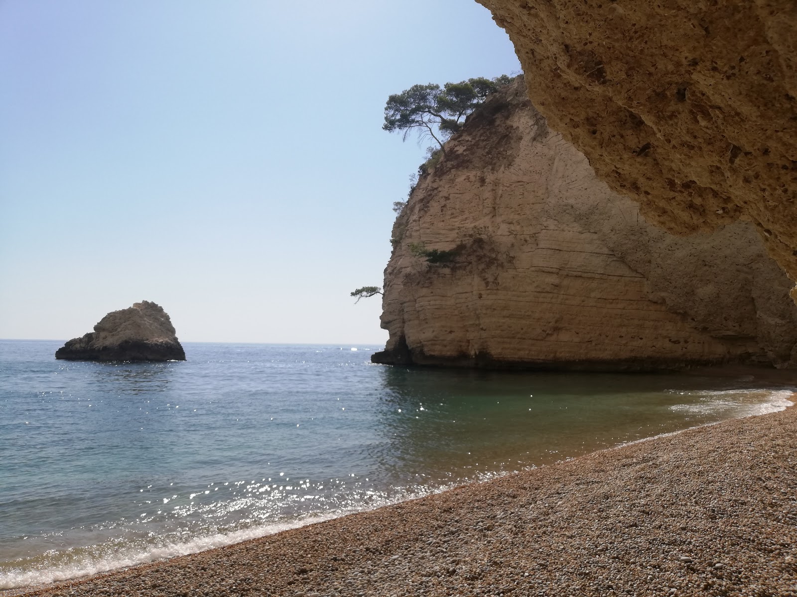 Spiaggia di Baia del Leone的照片 带有直岸短