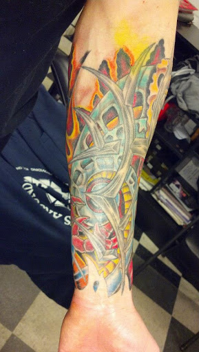 Explore thigh tattoo idea, creative tattoo ideas in Pelham, available at Tattoo Fever