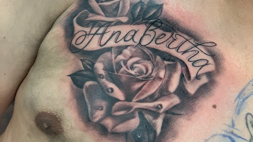 Explore neck tattoo ideas male, creative tattoo ideas in Fontana, available at Iconiq Tattoo Studio