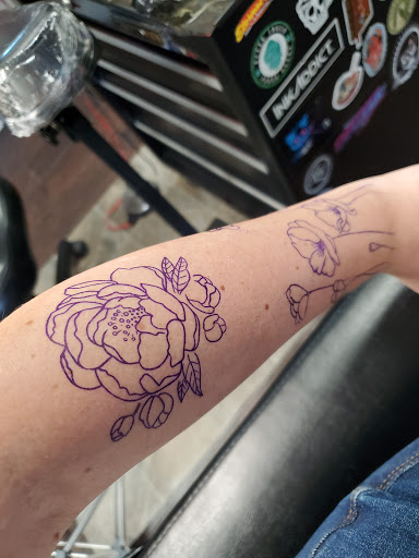 Explore back of neck tattoo cover up ideas, creative tattoo ideas in Traverse City, available at Ohana Tattoo