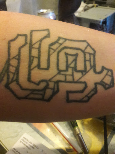 Explore trash polka tattoo ideas, creative tattoo ideas in Medford, available at A Body Mod