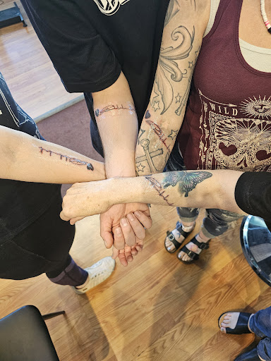 Explore hand tattoo ideas for man, creative tattoo ideas in Pueblo, available at Spellbound Electric Tattoos