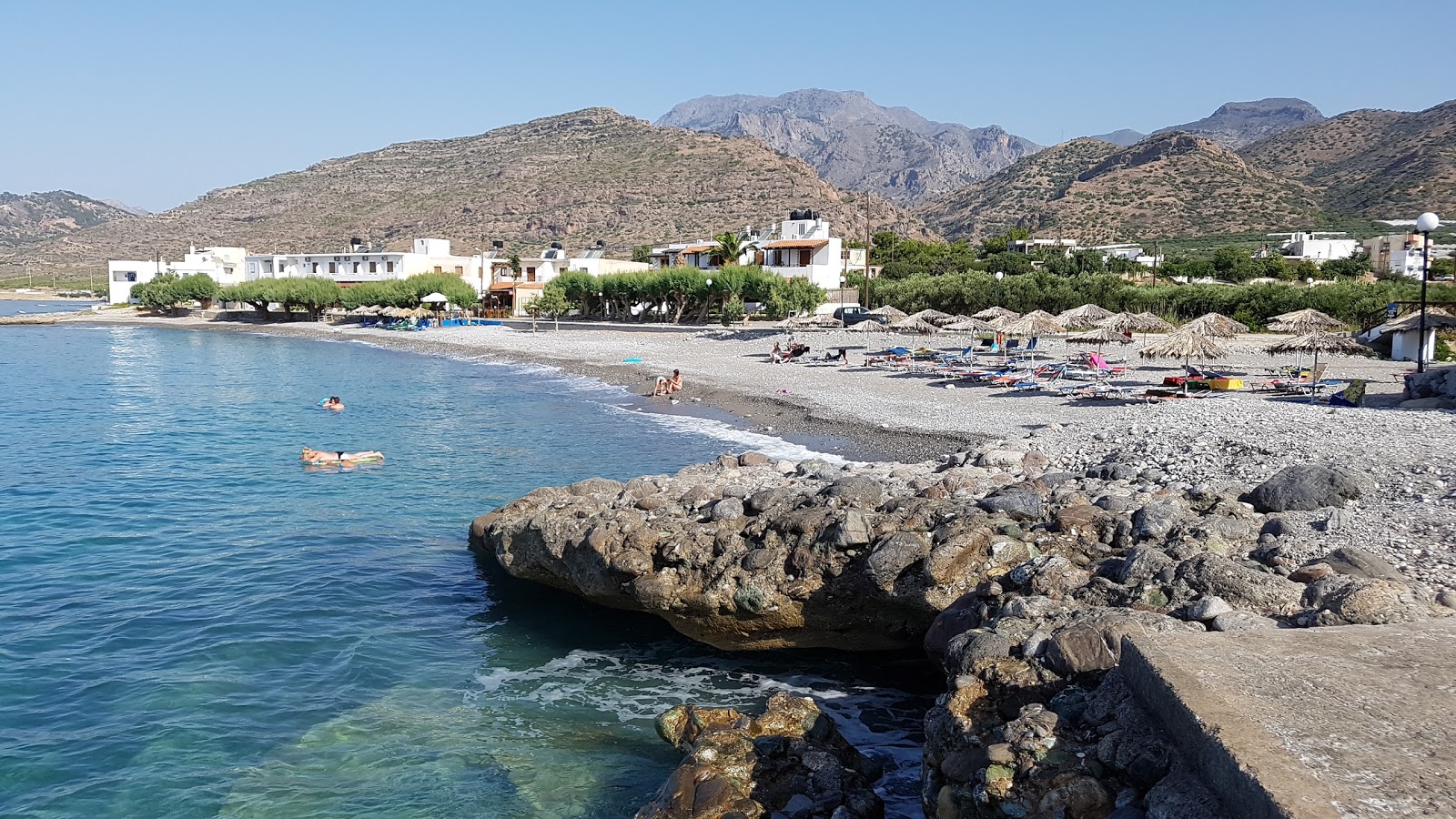 Photo of Koutsouri beach with turquoise pure water surface