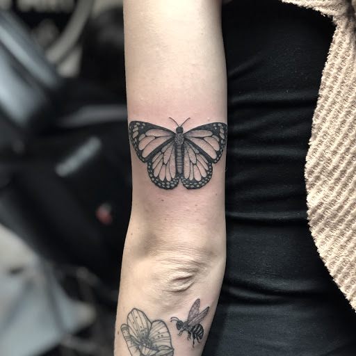 Explore alpha wolf tattoo ideas, creative tattoo ideas in Loveland, available at R&G Body Art