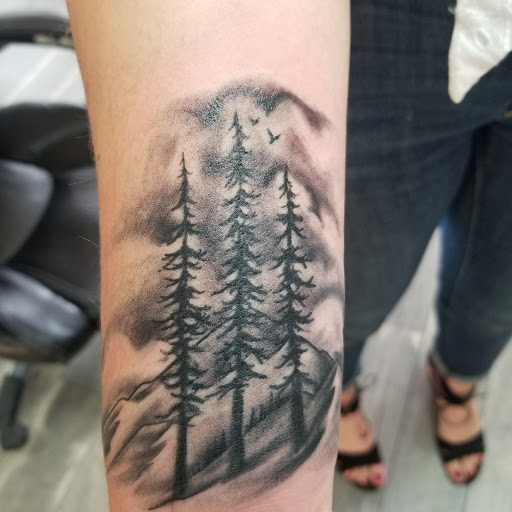 Explore black and white flower tattoo ideas, creative tattoo ideas in Coeur D Alene, available at Inkworld Tattoo