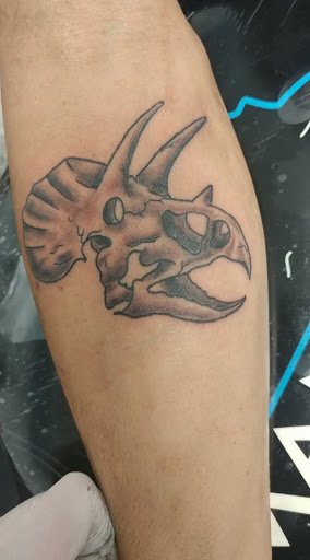 Explore calf sleeve tattoo ideas, creative tattoo ideas in Flint, available at Southern Outlaw Tattoo